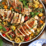 Overhead view of chicken pesto pasta in skillet