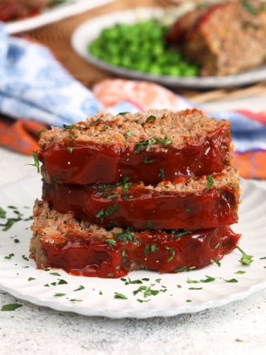 Stack of 3 slices of Cracker Barrel meatloaf on plate