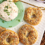 Overhead view of protein cottage cheese bagels with cream cheese on plate