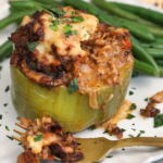Philly cheesesteak stuffed pepper on plate with fork