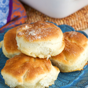 7 up Biscuits piled on a blue plate