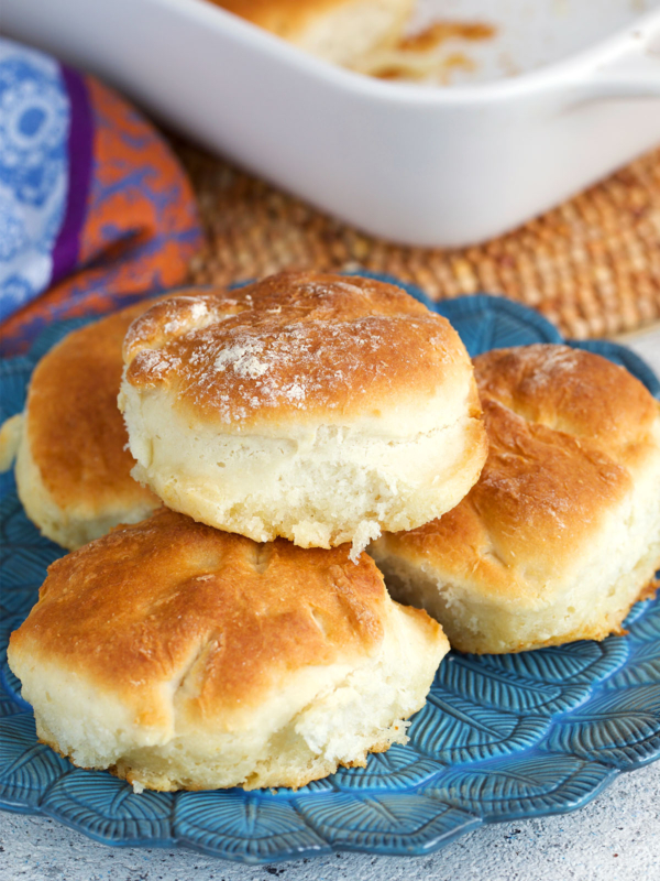 7 up Biscuits piled on a blue plate