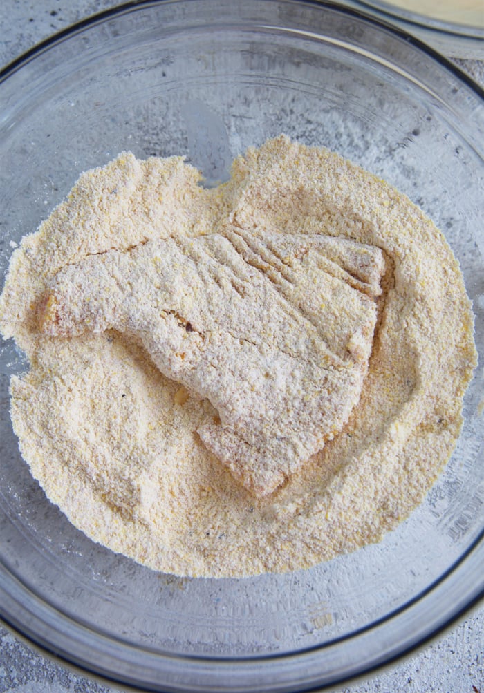 fresh catfish fillets in a cornmeal dredge
