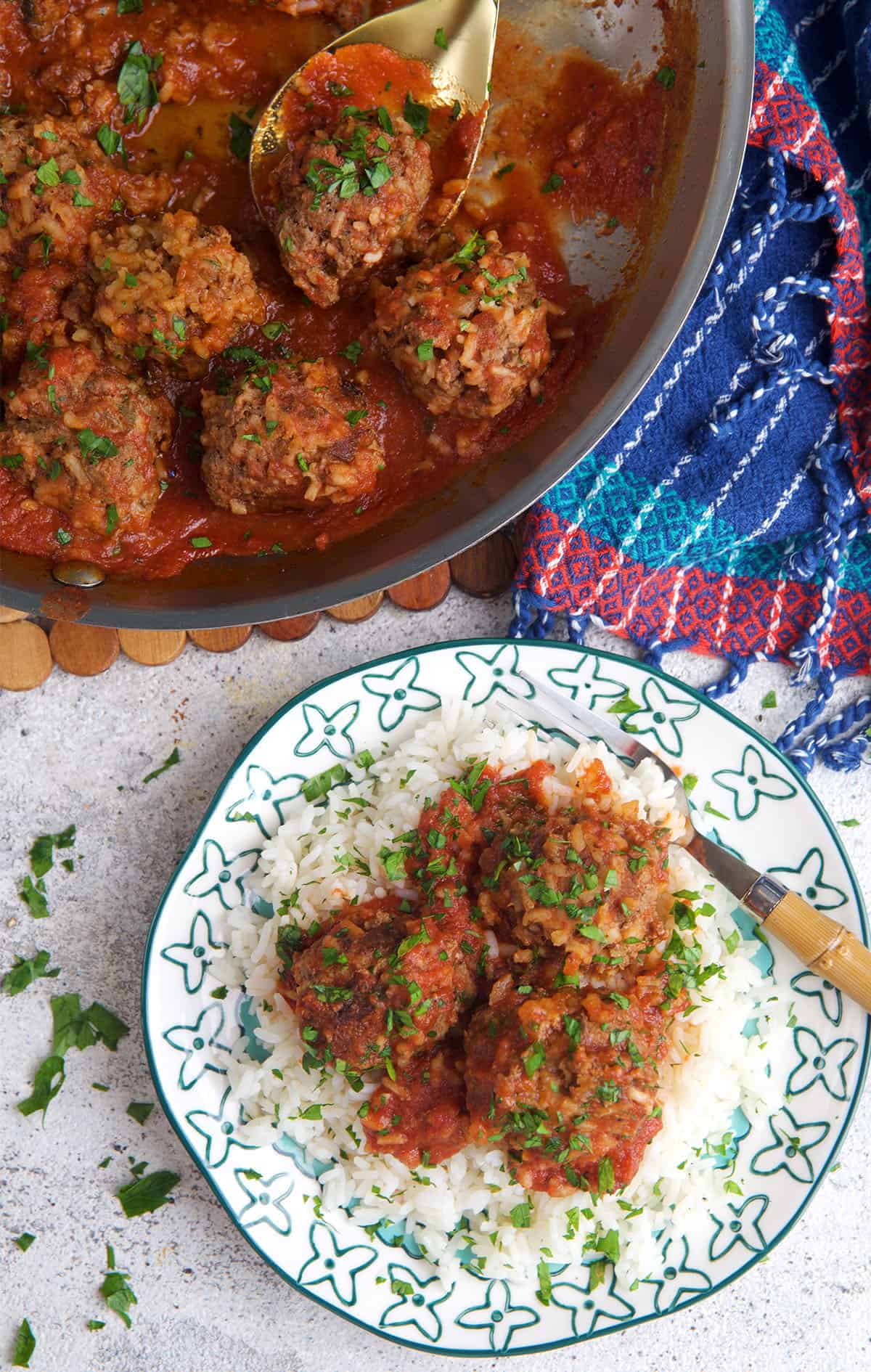 skillet with meatballs and a plate with a serving of meatballs over rice.