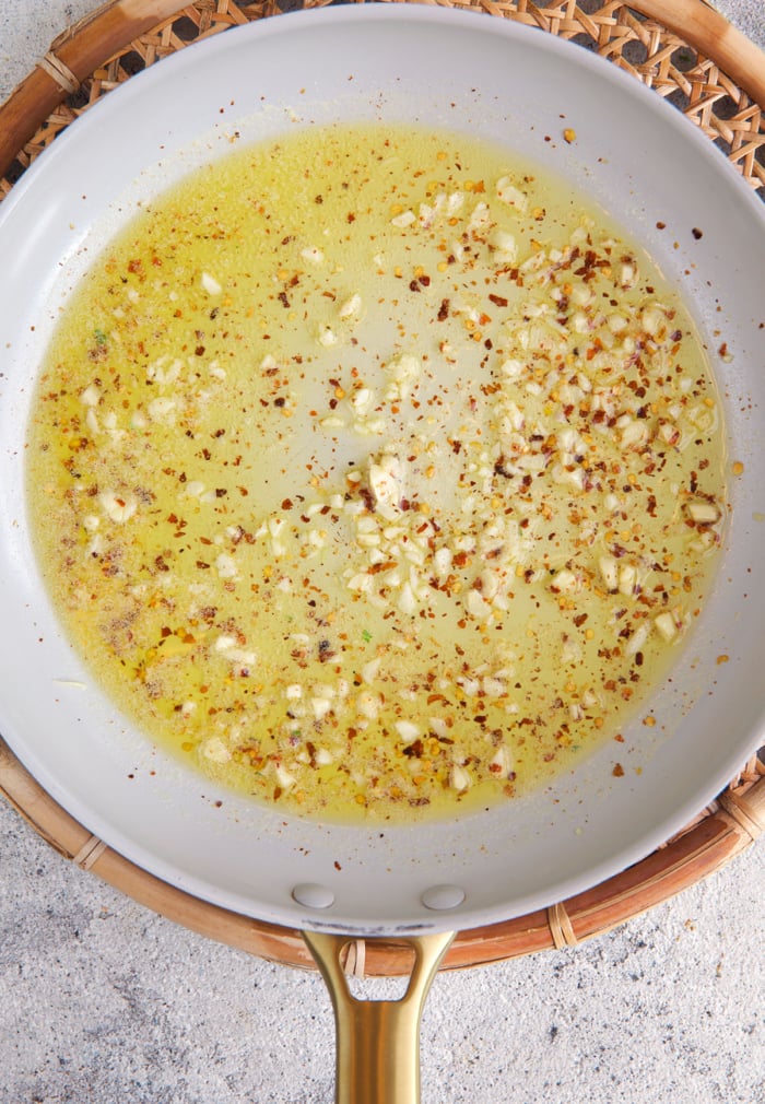 olive oil and garlic for pasta in a skillet
