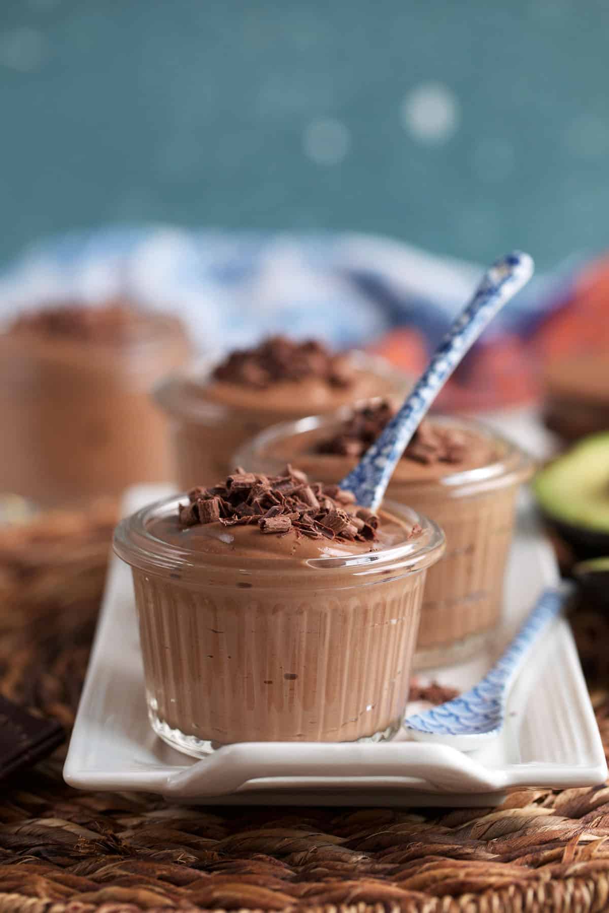 Protein pudding in a glass jar with shaved chocolate on top