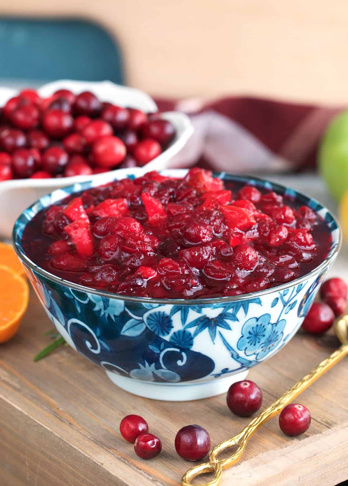 homemade whole berry cranberry sauce in a blue and white bowl