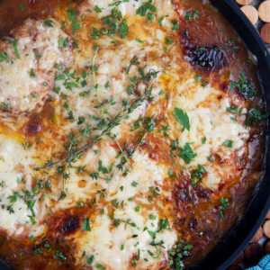 French Onion Pork Chops in a cast iron skillet