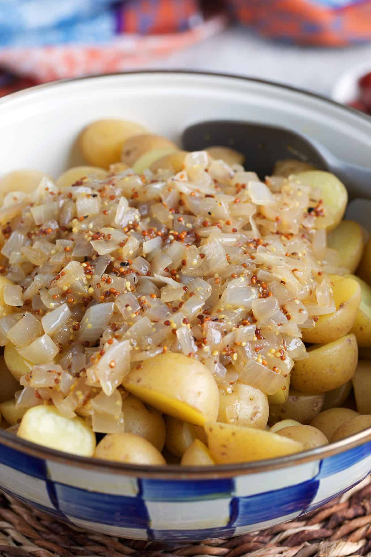 potatoes topped with bacon dressing