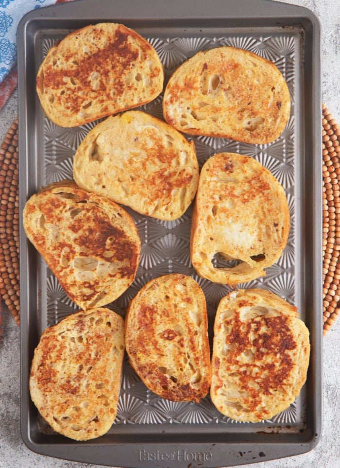 Sourdough French toast on a baking sheet after being cooked