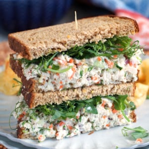 The best tuna salad sandwich with easy tuna salad recipe on a white plate