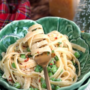 Christmas Fettuccine in a cabbage bowl with a gold fork.