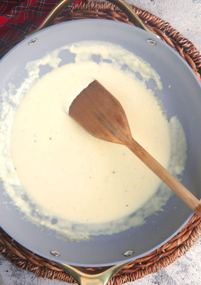 Alfredo sauce in a skillet