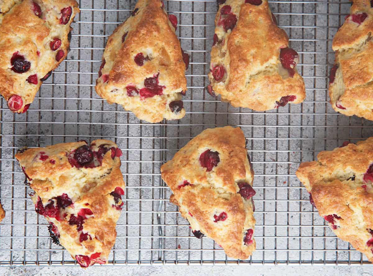 Cranberry Orange Scones on a wire cooling rack.