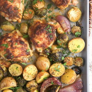 sheet pan chicken thighs with potatoes and onions