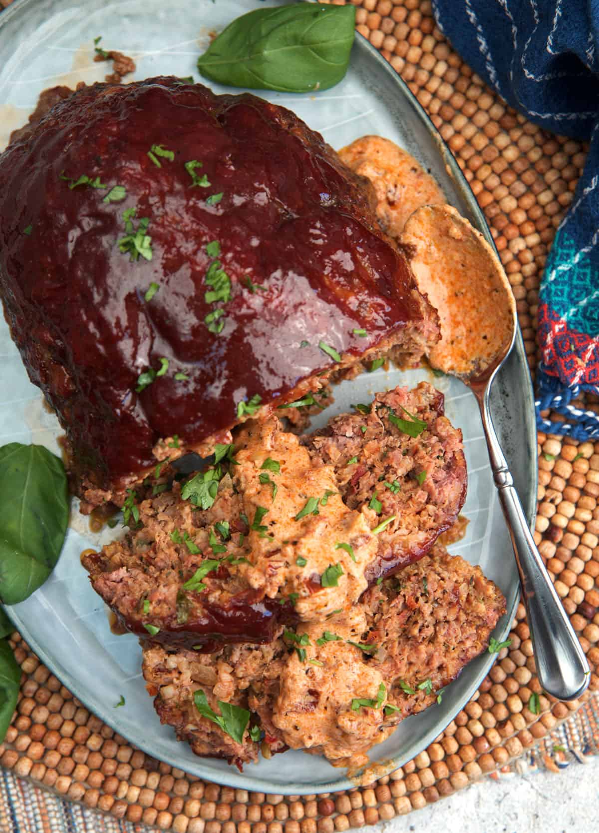 Marry Me Meatloaf on a platter with tuscan gravy