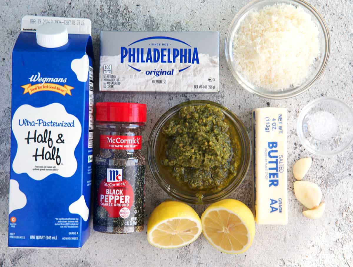 Ingredients for Pesto Cream sauce, half and half, pesto, cream cheese, butter, cheese and lemon.