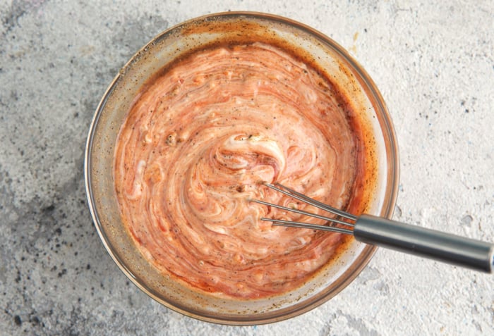 canes sauce ingredients being mixed in a bowl