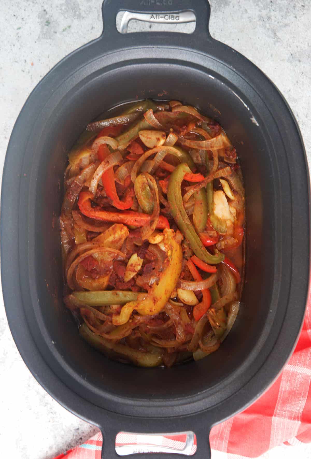 CrockPot Chicken Fajitas being cooked down for serving.