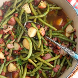 Southern green beans with potatoes and bacon in a stock pot after simmering for 30 minutes.