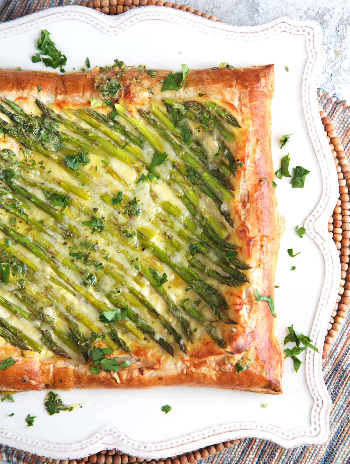 Asparagus Tart made with puff pastry and baked with gruyere cheese.