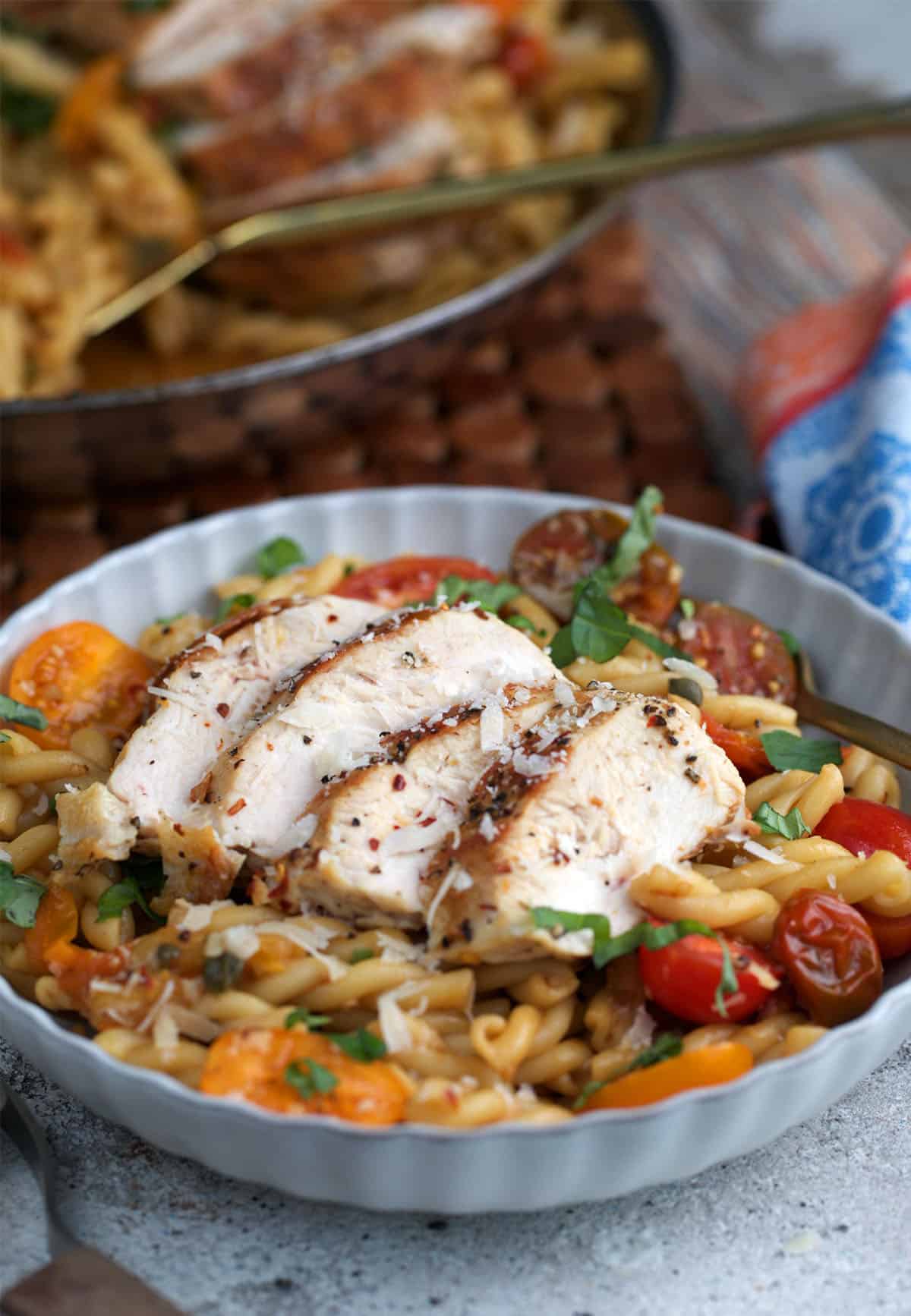 Bruschetta Chicken Pasta in a bowl ready to be served.