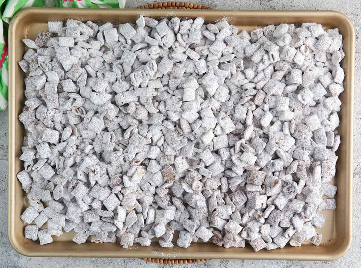 Puppy chow on a baking sheet to chill