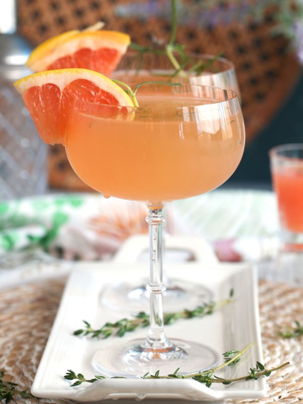 Two French Blondes on a white platter with a grapefruit wedge garnish