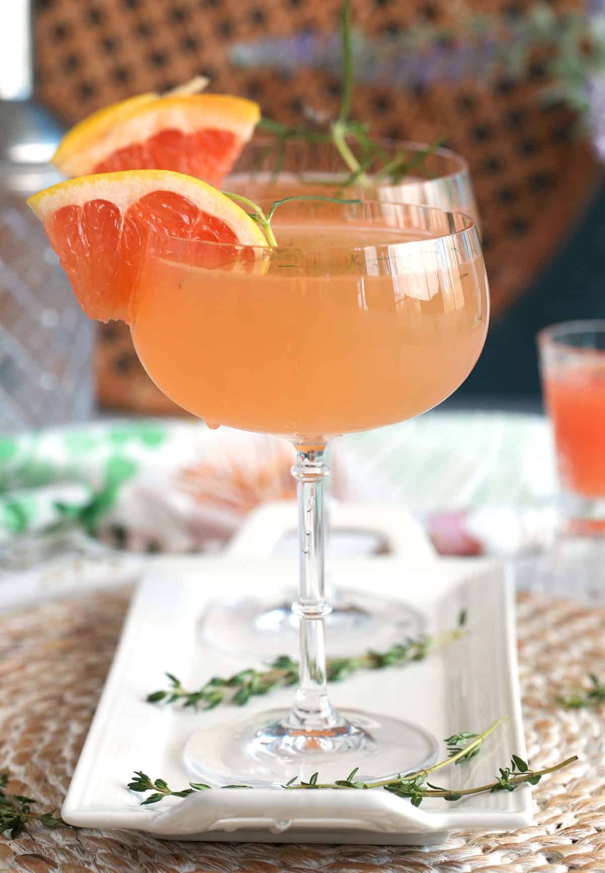 Two French Blondes on a white platter with a grapefruit wedge garnish