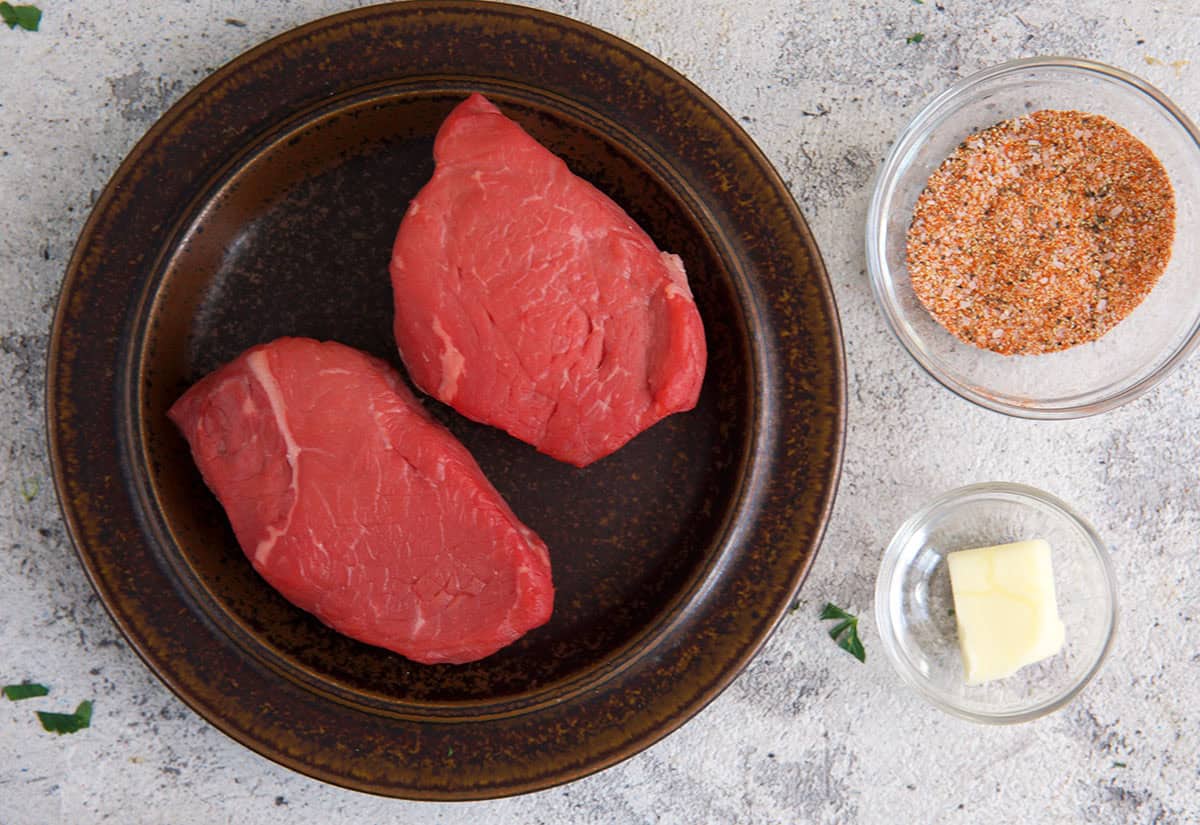 sirloin steak being prepped to be cooked in an air fryer