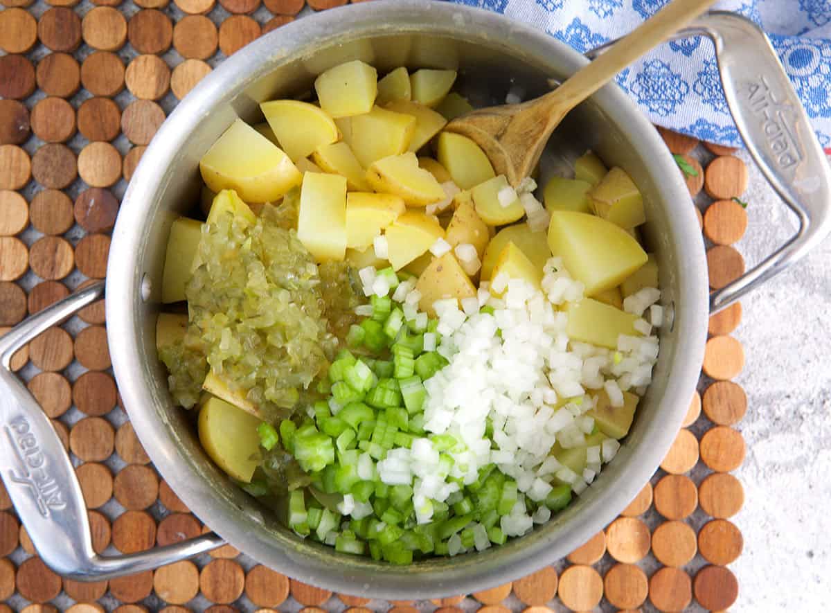 ingredients for potato salad in a steel stock pot