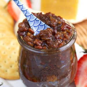 Bacon jam in a weck tulip jar with a blue and white floral spoon