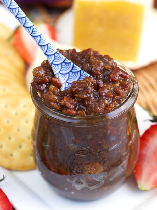 Bacon jam in a weck tulip jar with a blue and white floral spoon