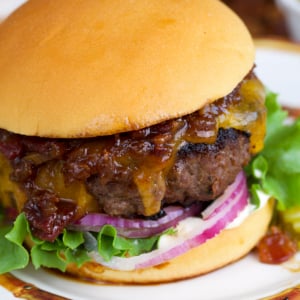 Cracker burger topped with bacon jam on a buttery soft roll