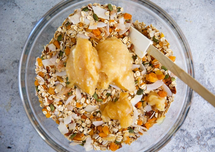 granola ingredients in a mixing bowl