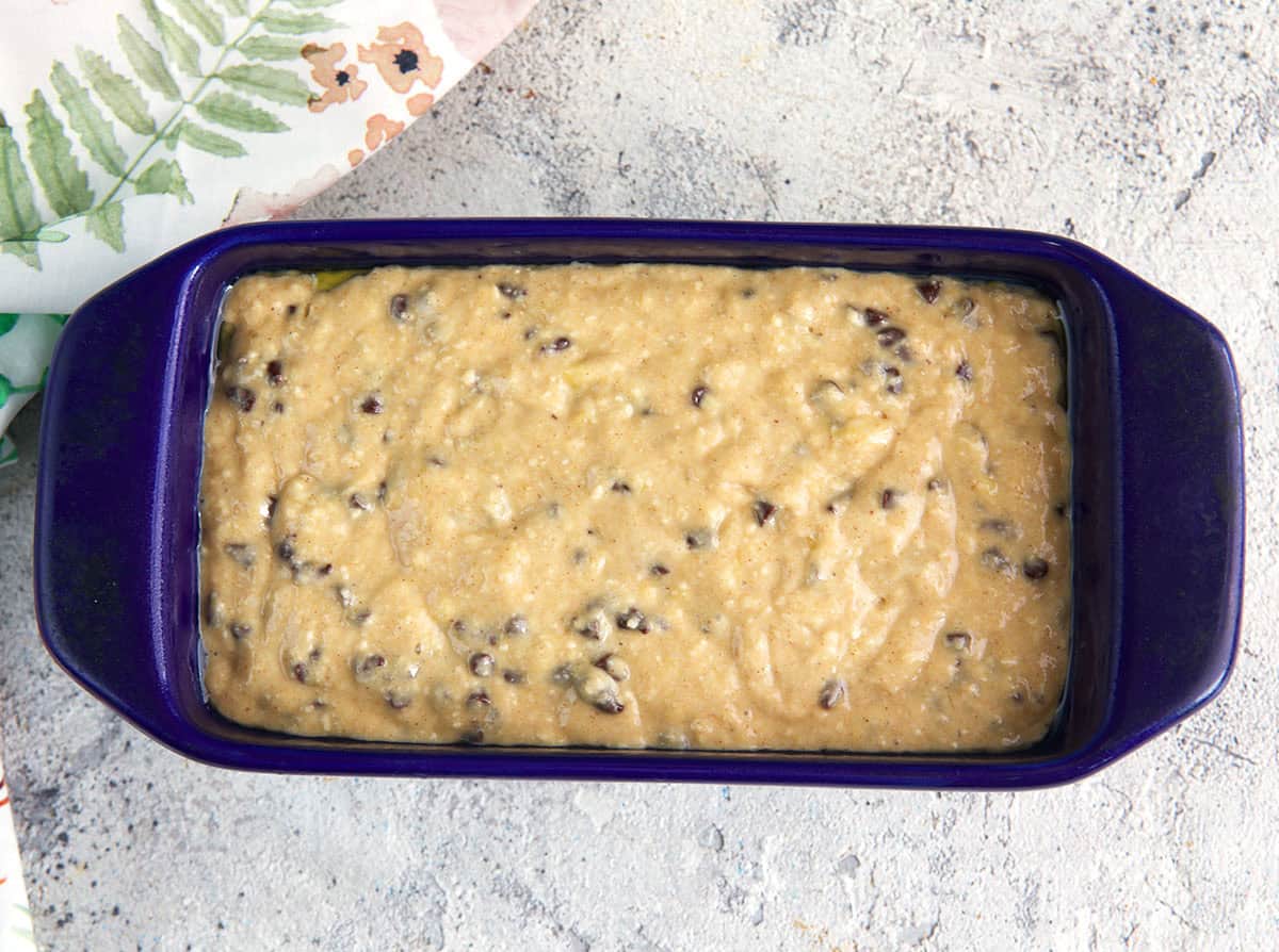 batter for sourdough banana bread in a loaf pan.