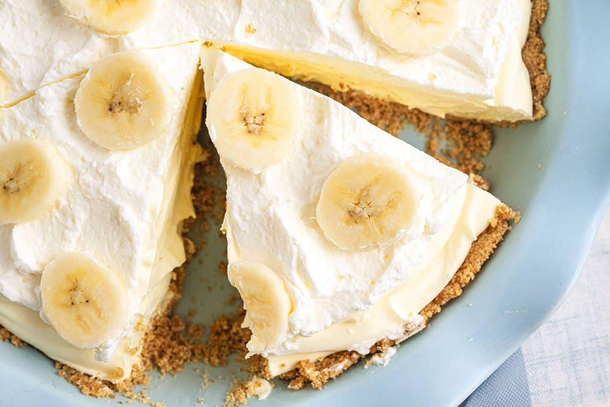 Easy Banana Cream Pie cut into slices for serving.