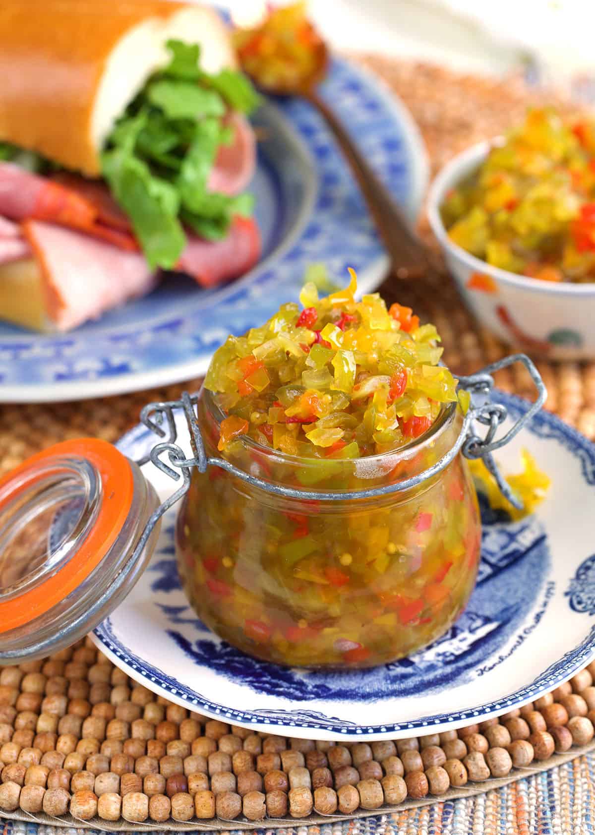 Pepper relish in a glass storage jar.