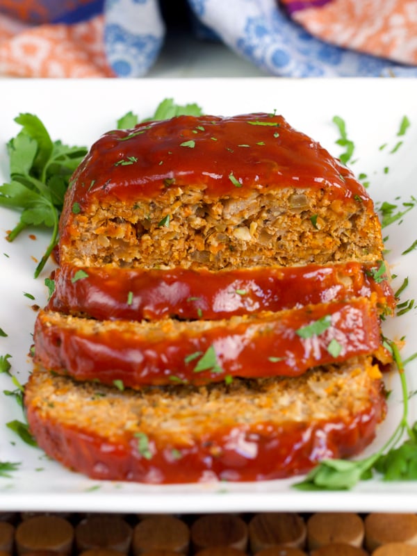Turkey Meatloaf on a white platter sliced ready to serve.