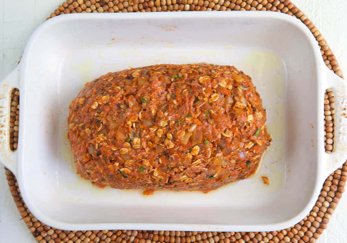 turkey meatloaf in a white baking dish before cooking.