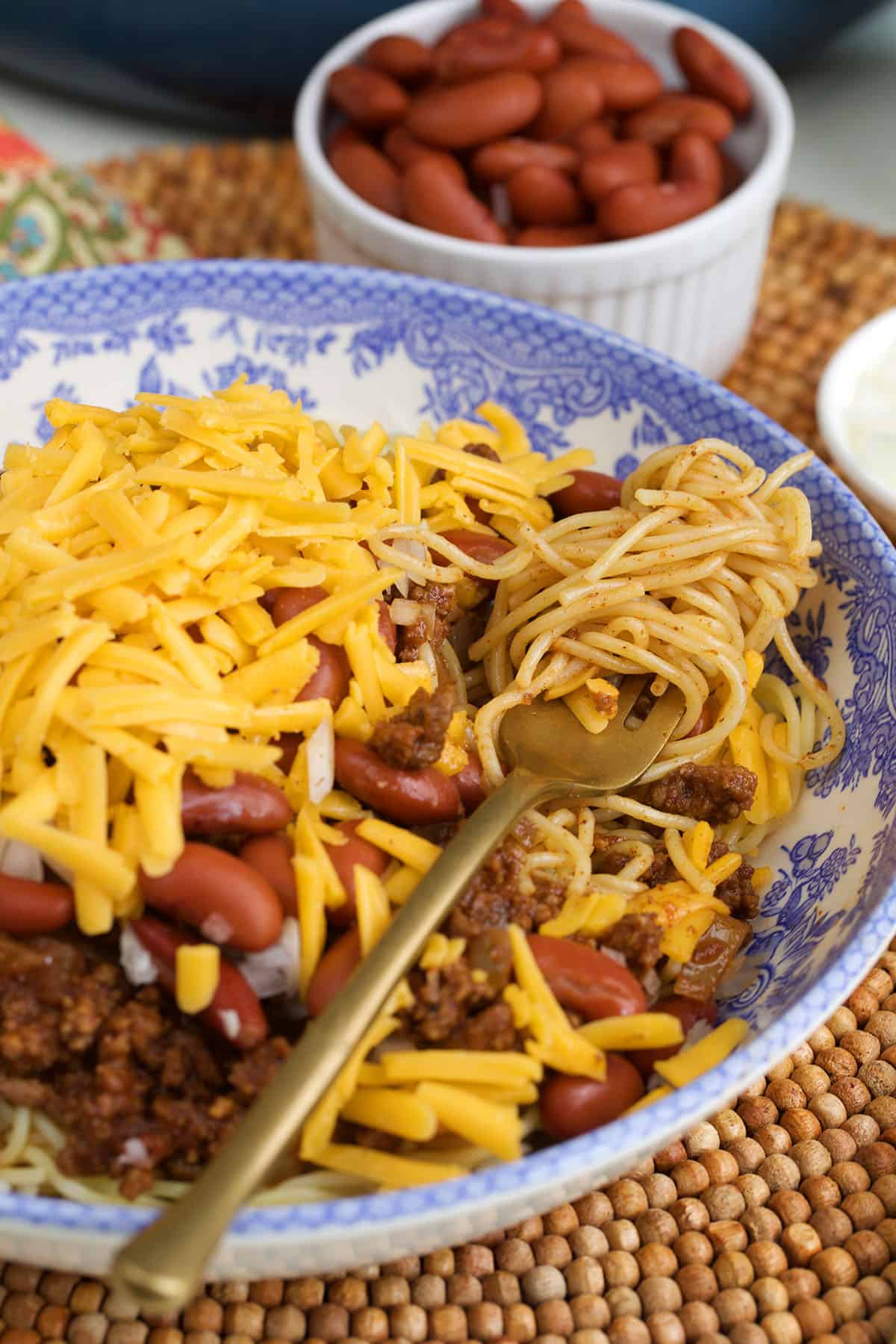 Cincinnati Chili, skyline chili recipe, in a bowl with a fork for serving.