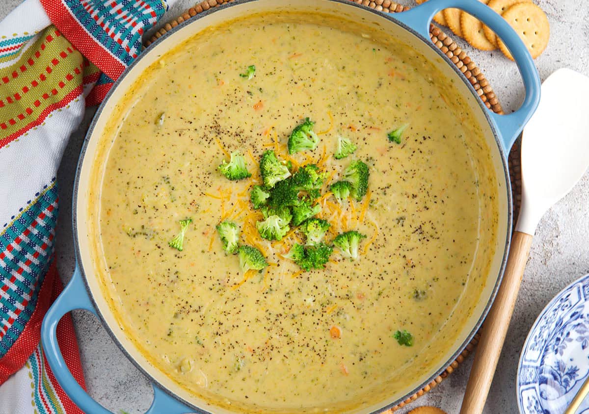 pot of broccoli potato soup topped with chopped broccoli