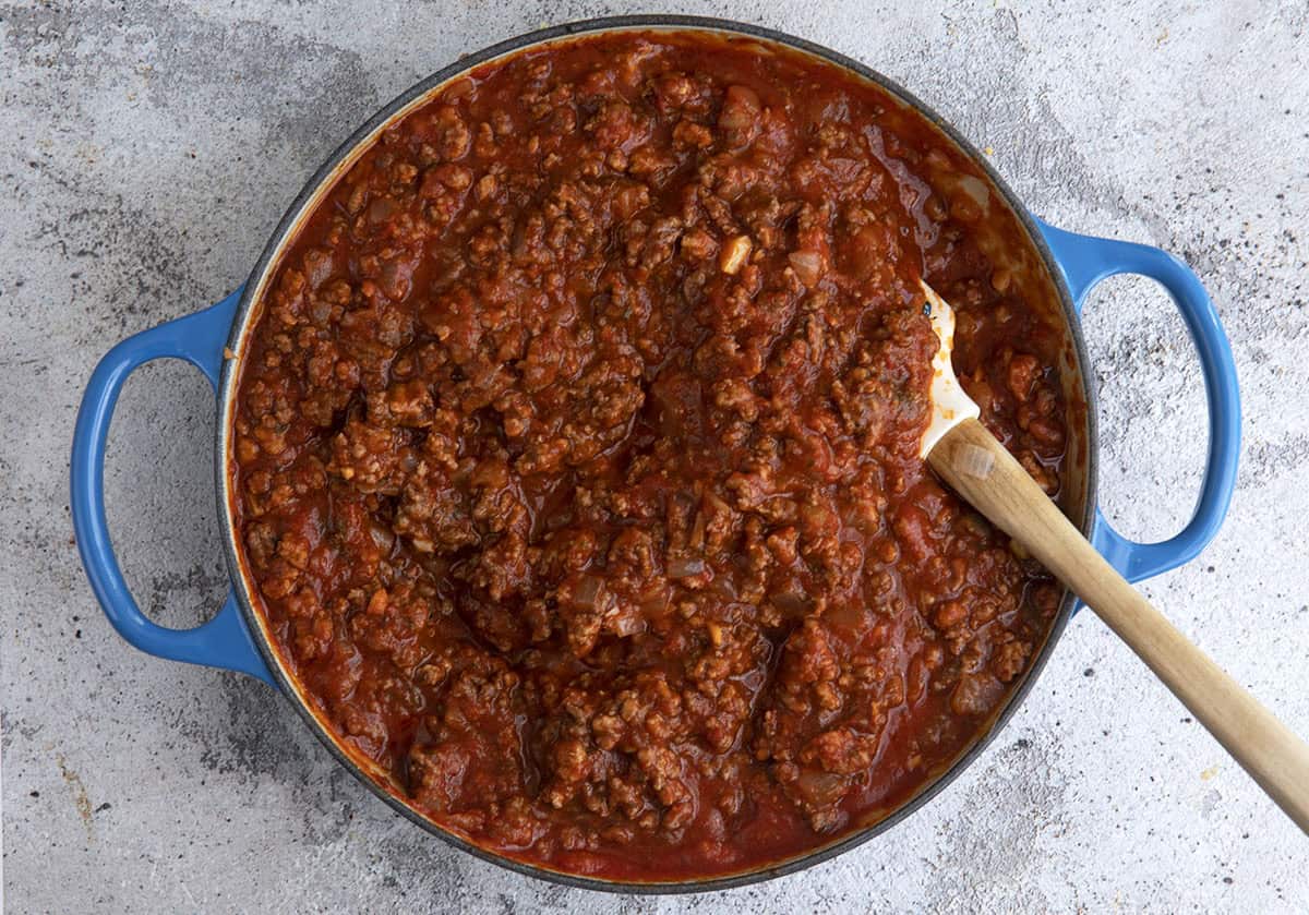 meat sauce for crockpot lasagna in a skillet with a spatula
